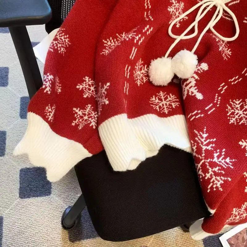 Moteriškas Kalėdinis Megztinis su Snaigių Raštu ir Kaspinu - V Formos Iškirptė
