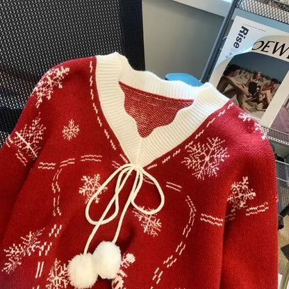 Moteriškas Kalėdinis Megztinis su Snaigių Raštu ir Kaspinu - V Formos Iškirptė